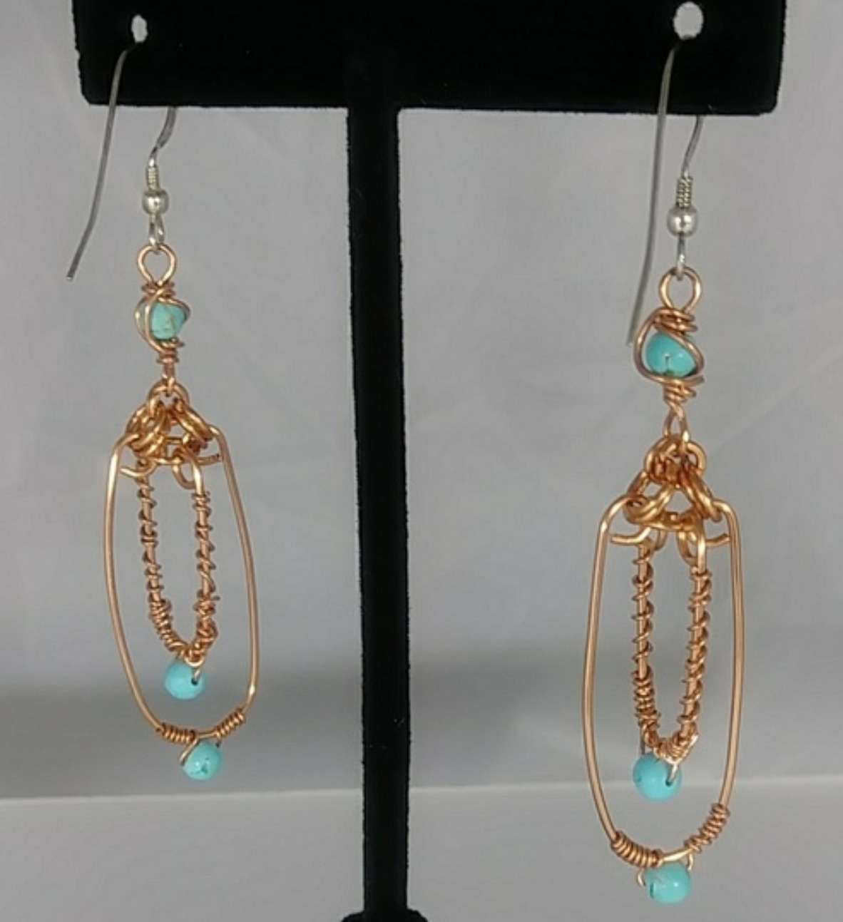 616 - EAR - Description:  Earrings: Copper Wire, Turquoise Howlite Gemstones - Sterling Silver Earwire  Dimension: 2 1/2 ' L (Inches)