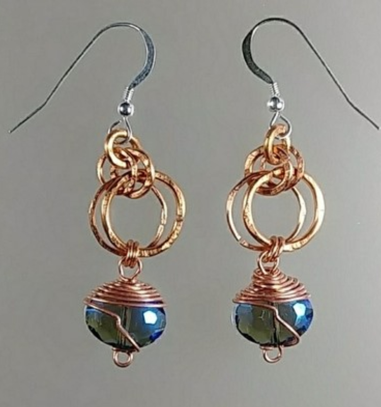 610 - EAR - Description: Earrings: Copper Wire, Faceted Glass Beads, Sterling Silver Earwire  Dimension: 2 ' L (Inches)