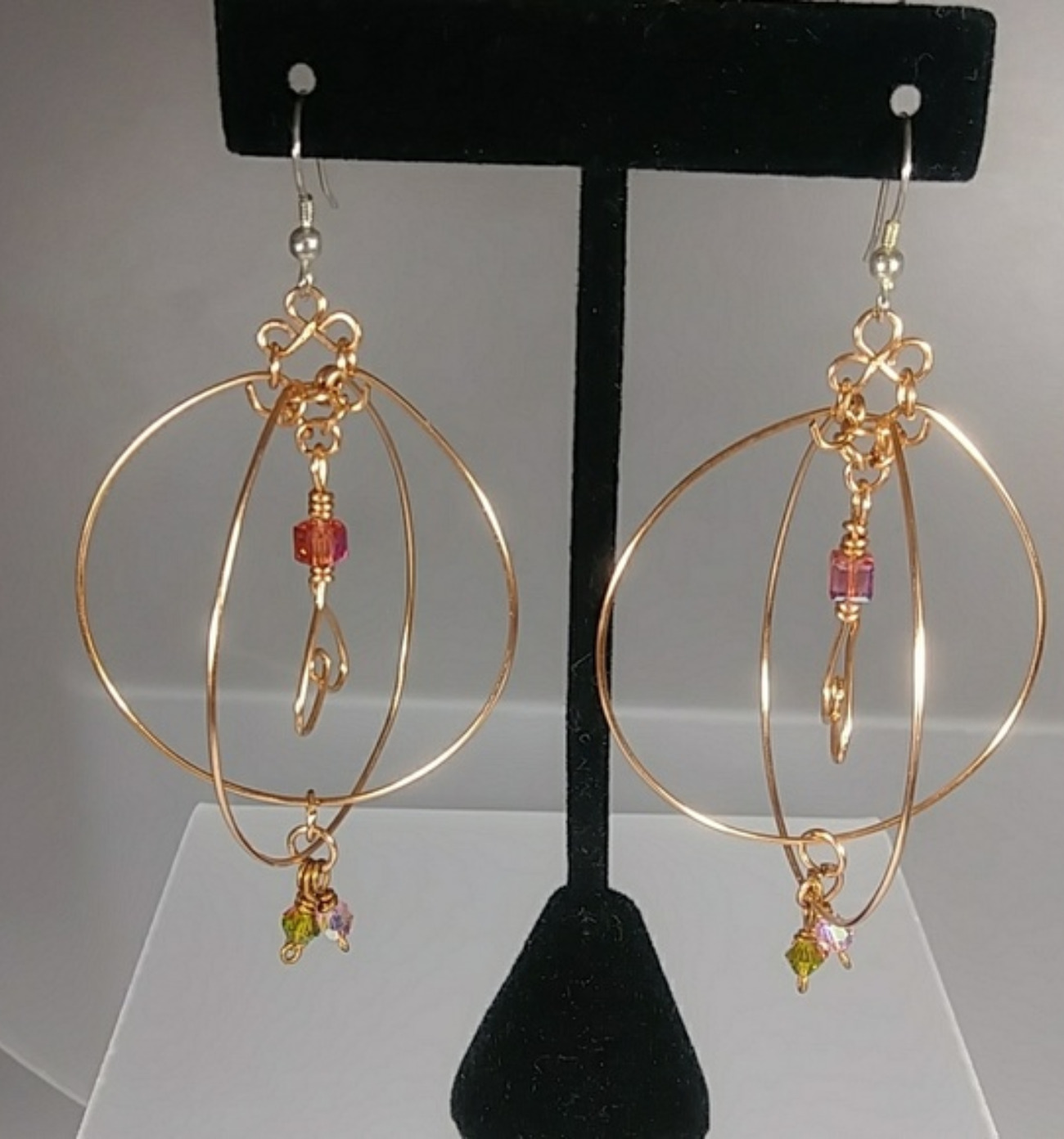 601 - EAR - Description: Earrings: Copper Wire, Swarovski Crystal Beads, 3 1/2” (inches/Length) 2 ” (inches/Width) Sterling Silver Fishhook Earwire