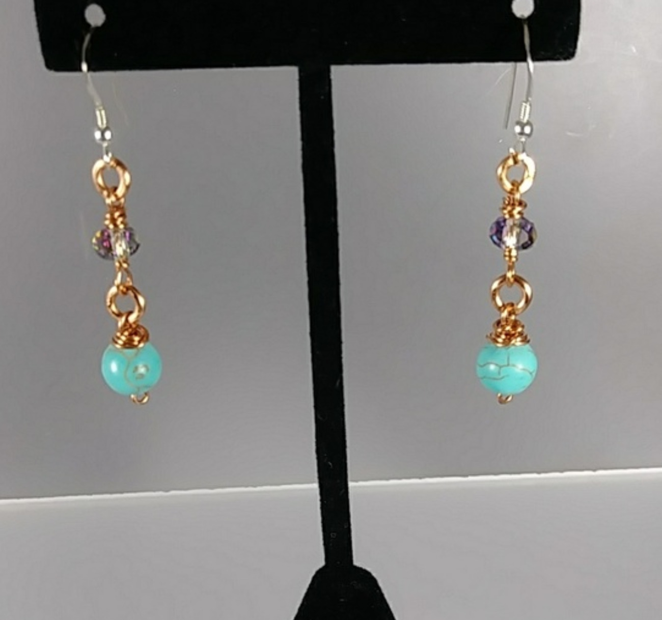 618 - EAR - Description: Earrings: Material: Copper Wire, Turquoise Howlite Gemstone, Swarovski - Crystal Sterling Earwire  Dimension: 1 3/4 ' L (Inches)