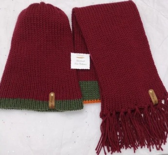 - Unisex Accessories - Material: 100% Acrylic / Custom Riveted Faux Leather Tags - Care: Hand Wash, Cold Water, Dry Flat - Construction: Double Layered Knit Scarf and Beanie - Size: Adult (One Size) Stretchable Beanie and Matching Scarf (See photos for measurement indicators) - Color(s): Burgundy, Orange, Mixed Color Variation and Forrest Green - Item packed in clear resealable plastic storage bag
