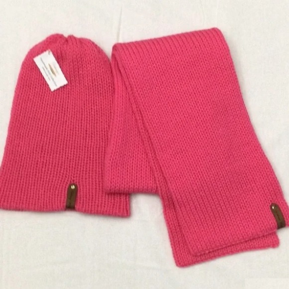- Unisex Accessories - Material: 100% Acrylic Yarn, Custom Riveted Faux Leather Tags  Construction: Double Layered Knit Scarf and Beanie    Color(s): Rose Pink  Size: OS Stretchable 