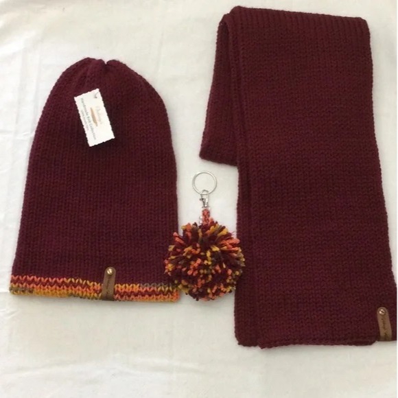 Material: 100% Acrylic Yarn, Custom Riveted Faux Leather Tags  Construction: Double Layered Knit Scarf and Beanie    Color(s): Burgundy and Mixed-Colored Yarn  Size: OS Stretchable 