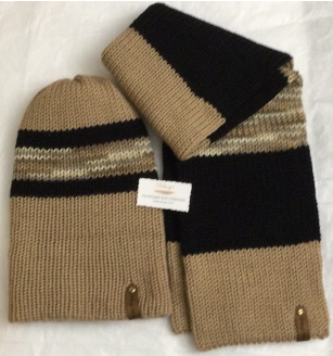 Material: 100% Acrylic Yarn, Custom Riveted Faux Leather Tags  Construction: Double Layered Knit Scarf and Beanie    Color(s): Barley, Chocolate Brown and Toasted Almond  Size: OS Stretchable 