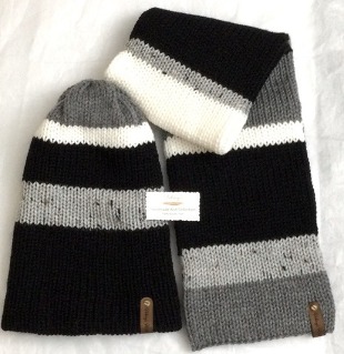 - Unisex Accessories Material: 100% Acrylic Yarn, Custom Riveted Faux Leather Tags  Construction: Double Layered Knit Scarf and Beanie    Color(s): Tweed, Gray, Black and White  Size: OS Stretchable 