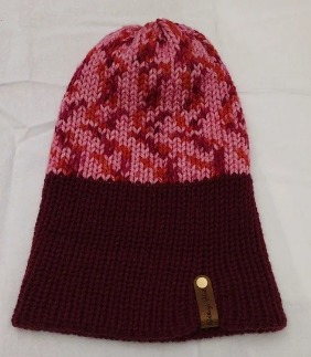 - Unisex Accessory - Material: 100% Acrylic Yarn / Custom Faux Leather Tag - Care: Hand Wash, Cold Water, Dry Flat - Construction: Reversible, Double Layered Knit Beanie (handmade) - Size: Adult (One Size) Stretchable - Color(s): Burgundy and Multi-Colored Yarn - Item packed in clear resealable plastic storage bag